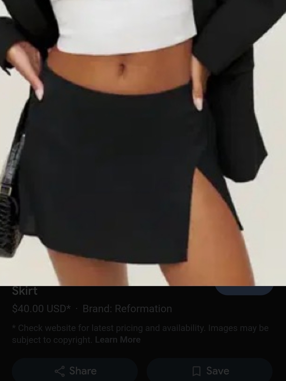Reformation Black Mini Skirt. Slim Cut with Subtle Slit